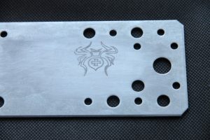Laser etching of metal surfaces using different chemicals