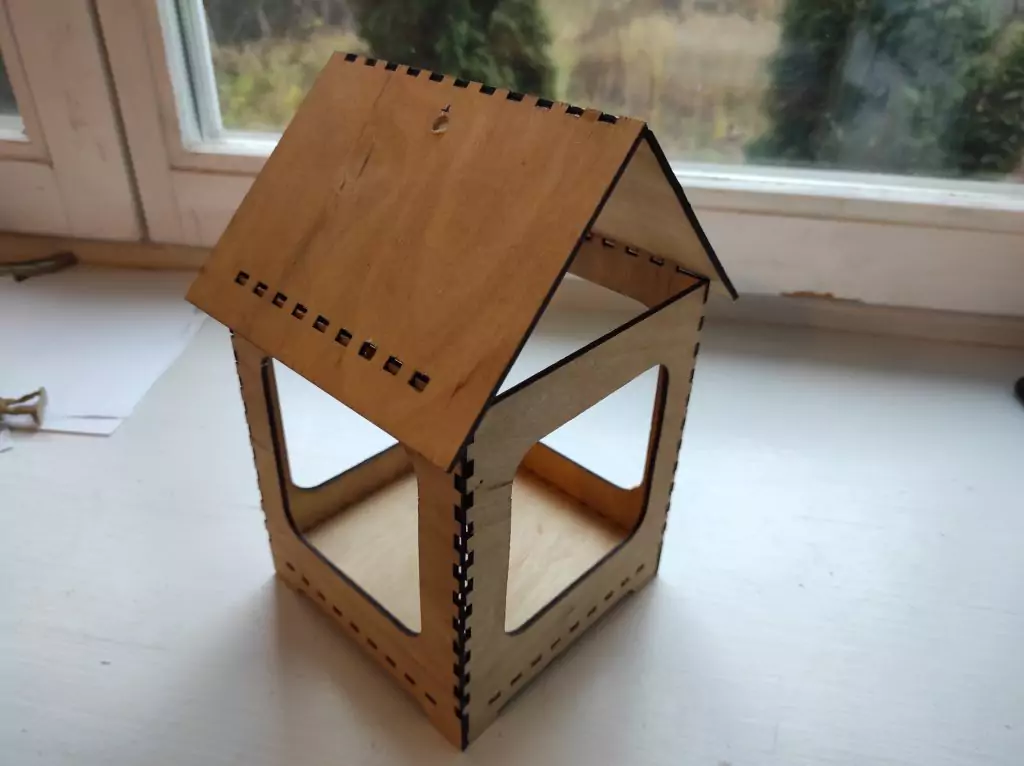 A DIY plywood bird feeder
