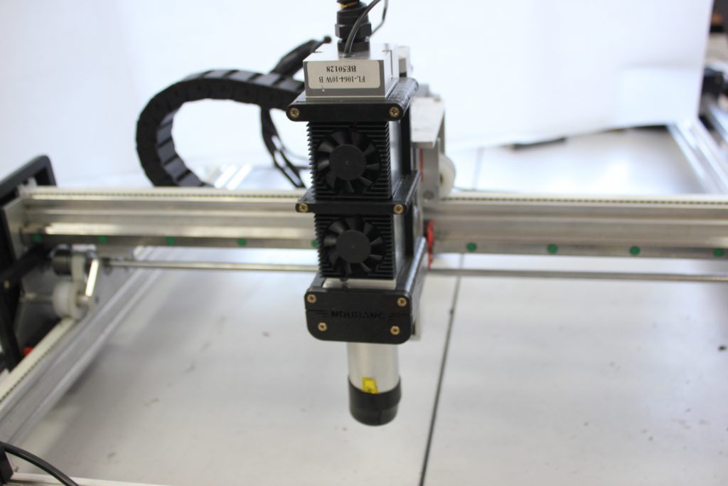 An Endurance 4 watt infrared diode-pumped solid-state (DPSS) laser metal marking head