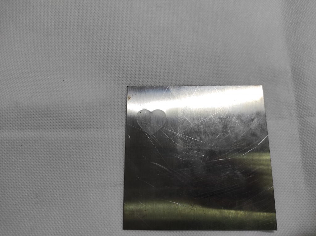 A strange effect on a stainless steel (embossing)