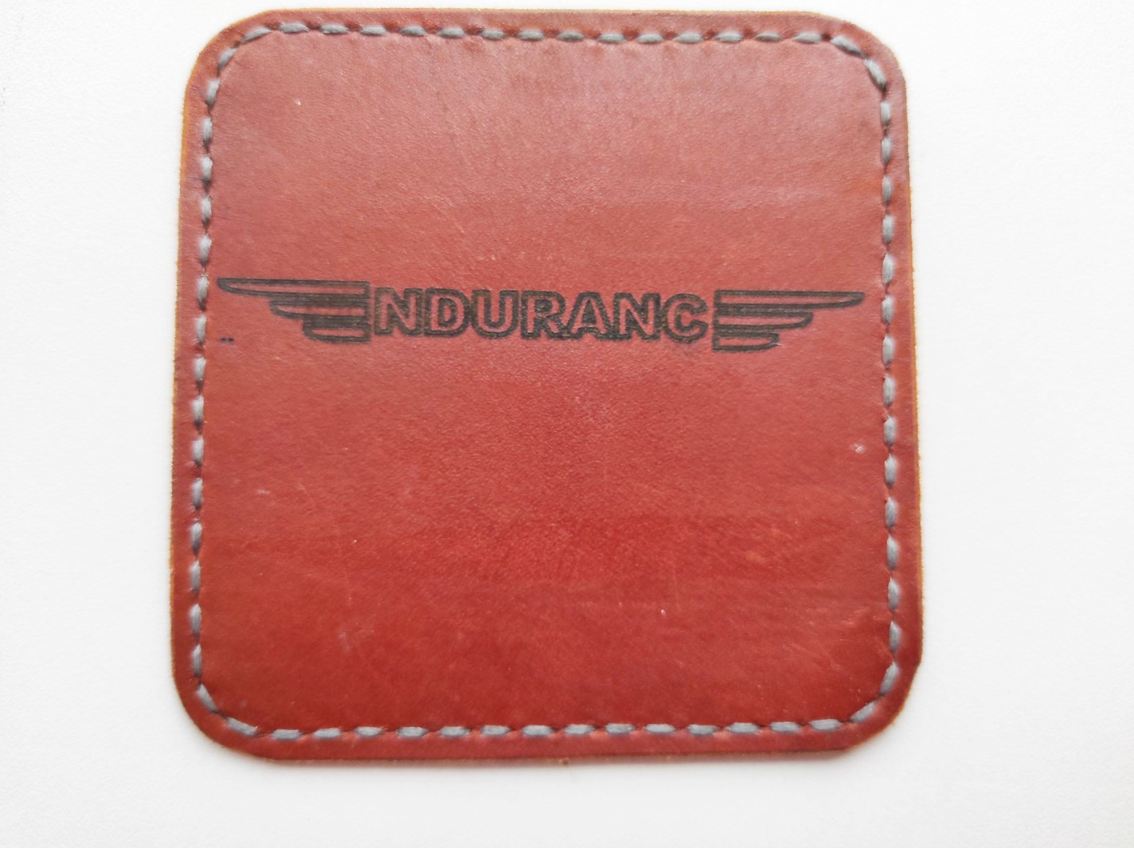 Laser engraving and cutting leather