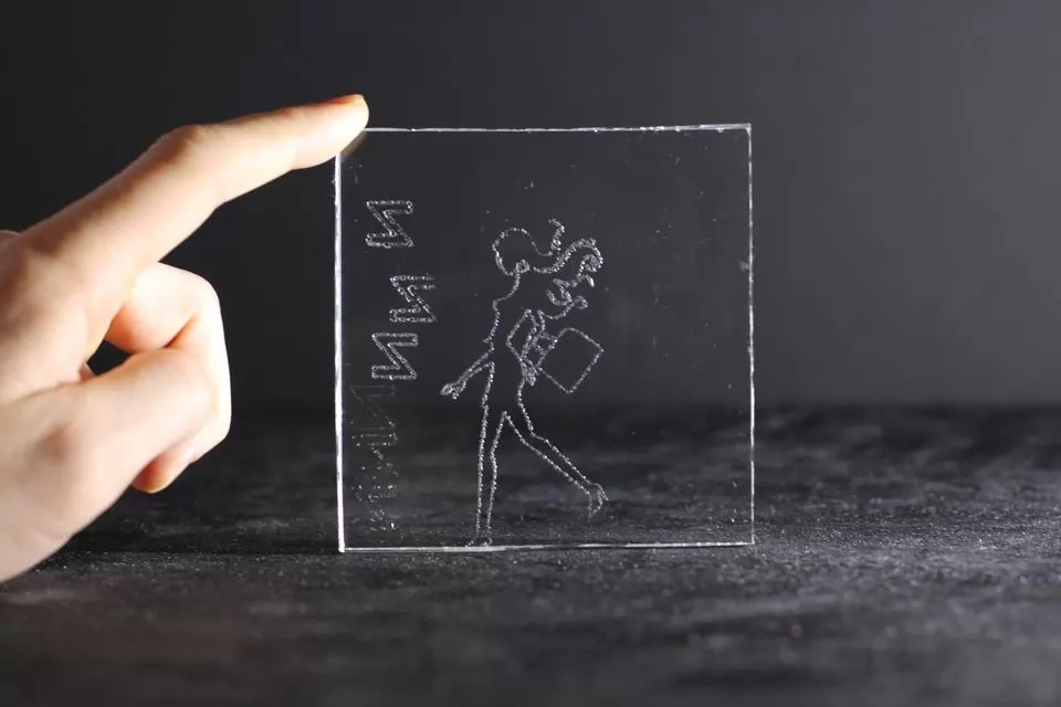 A girl laser engraved on acrylic