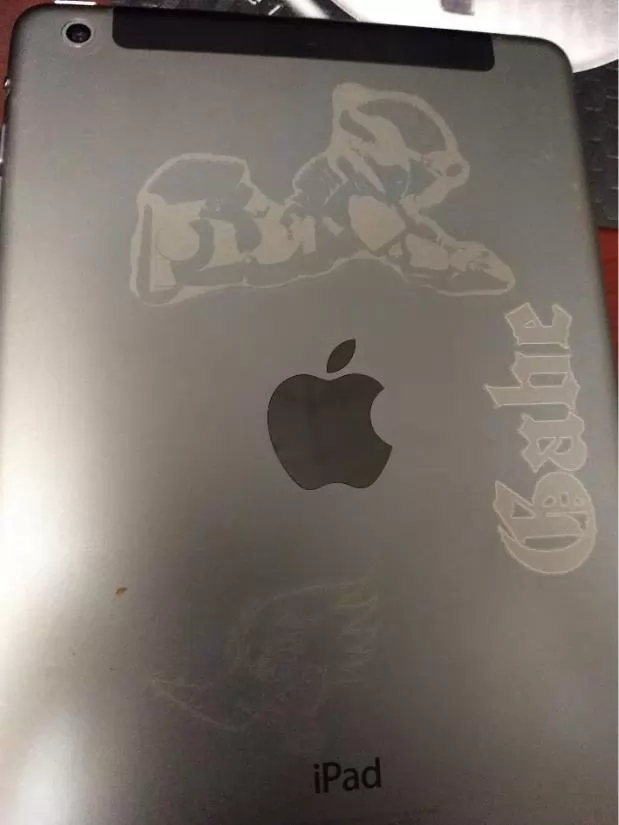 Metal backed IPad laser engraving