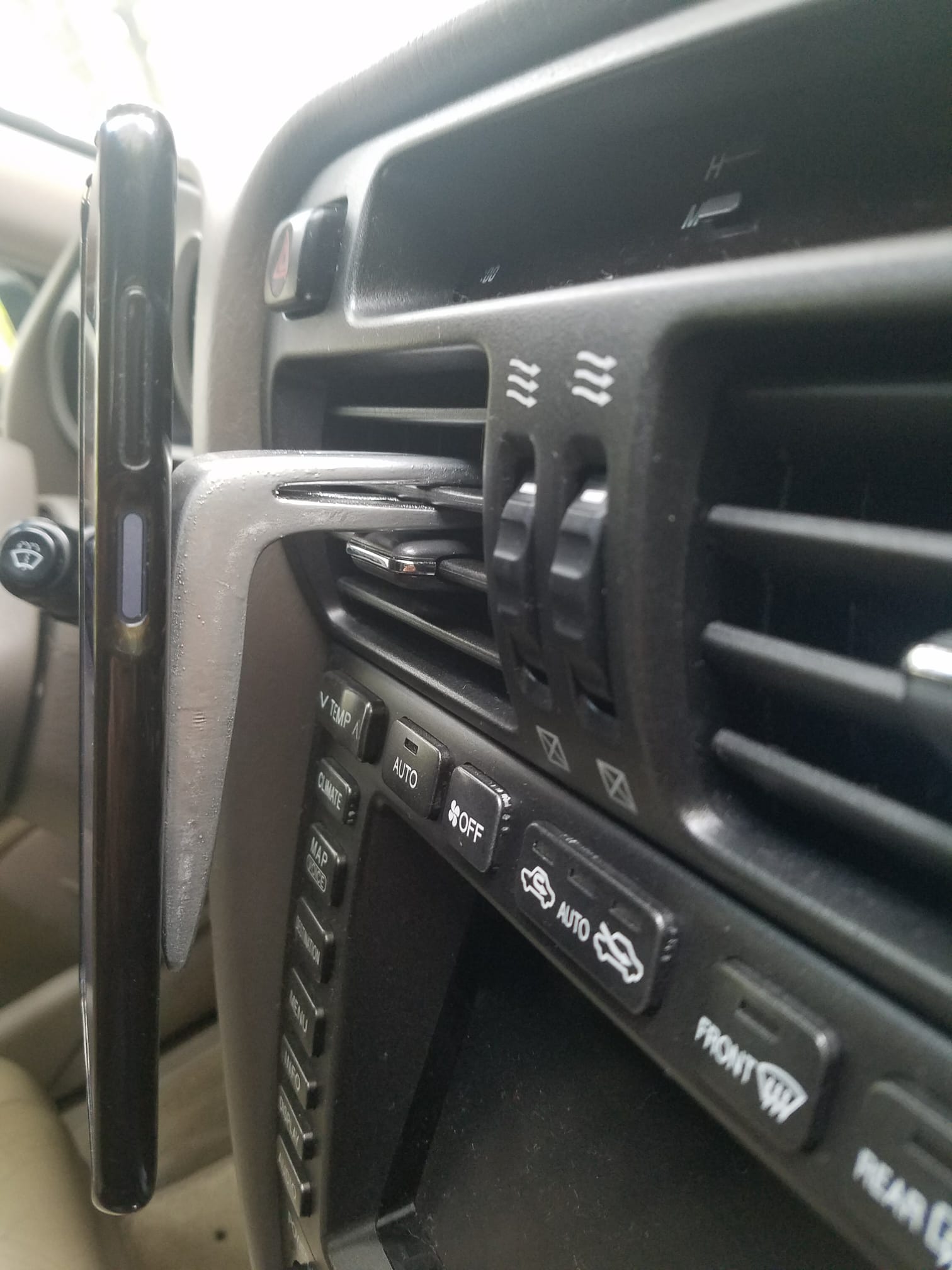 A DIY plywood smartphone holder for your car