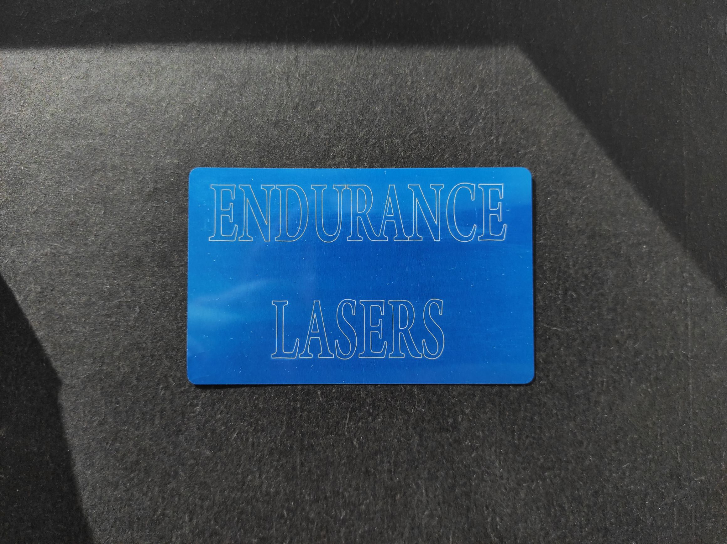 Anodized aluminum laser engraving / marking with DPSS infrared Nd:YAG laser