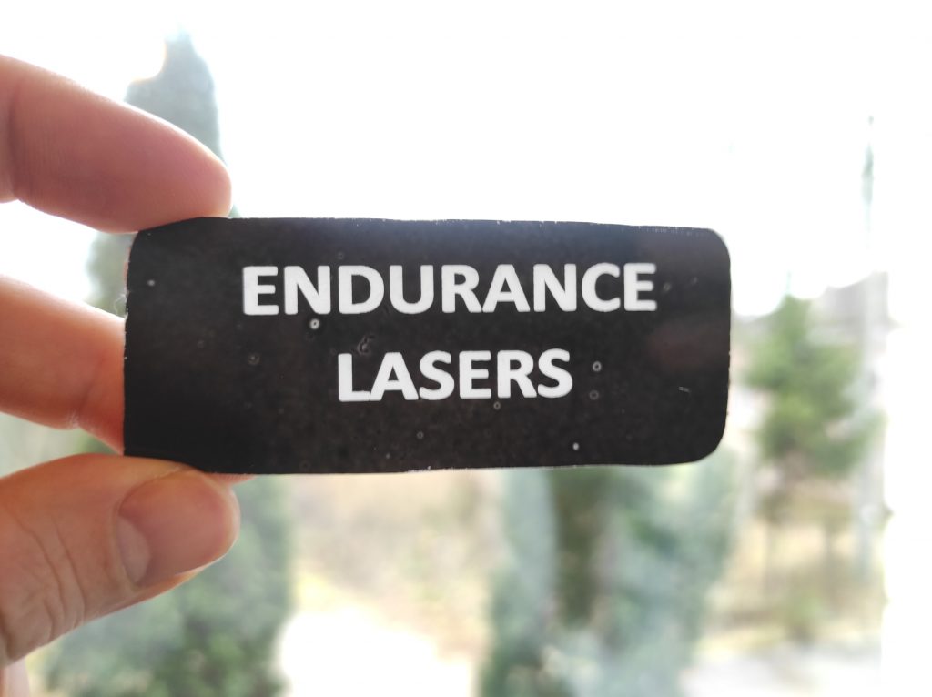 Laser engraving and cutting of acrylic and plastic